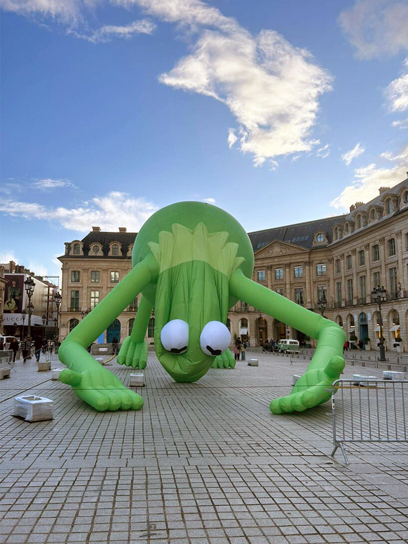 alex da corte's giant kermit the frog lands in place vendôme during art basel paris