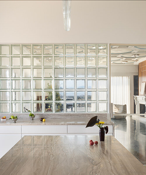glass blocks and marble surfaces illuminate the renovation of 1960s athens penthouse