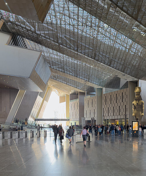 gazing toward the pyramids of giza, the grand egyptian museum opens to visitors