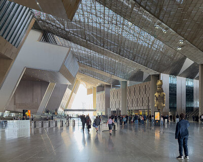 gazing toward the pyramids of giza, the grand egyptian museum opens to visitors