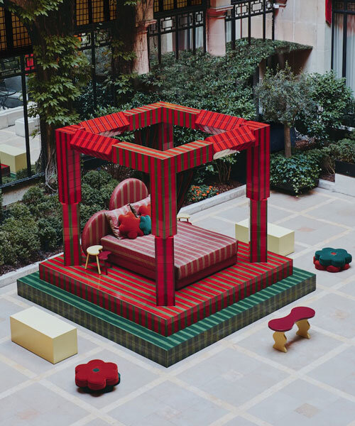 green and red ceramic tiles clad sculptural daybed by uchronia at h?tel plaza athénée, paris