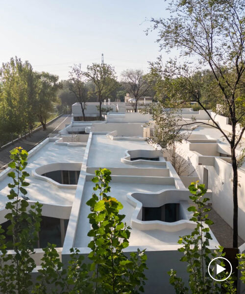 cluster of interwoven white courtyard houses reinterprets ancient kilns for resort in china