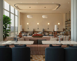IDST pairs memphis playfulness with mediterranean ease in wave restaurant, dubai