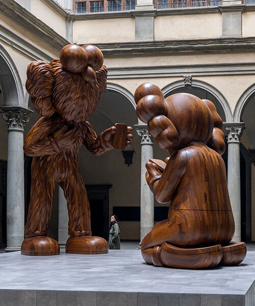 KAWS lands in renaissance florence with large-scale timber installation 'the message'