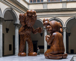 KAWS lands in renaissance florence with large-scale timber installation 'the message'