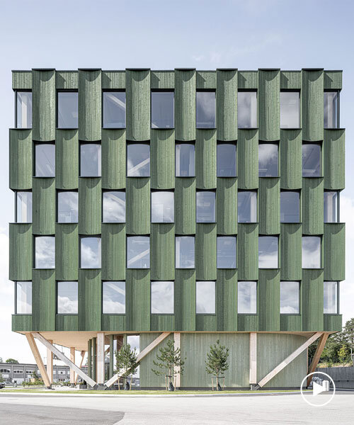 green timber curves sculpt rhythmic facade for office building in norway