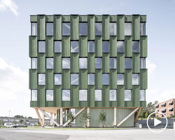 green timber curves sculpt rhythmic facade for office building in norway