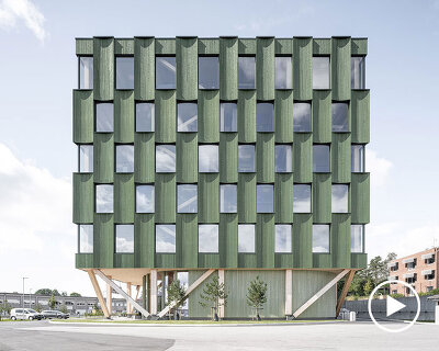 green timber curves sculpt rhythmic facade for office building in norway