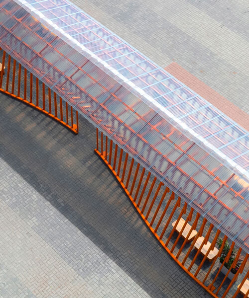 nudes' flow pavilion forms sinuous steel-pipe bridge between two exhibition halls in india