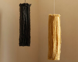 bacterial cellulose transforms into translucent ruffled lighting sculptures