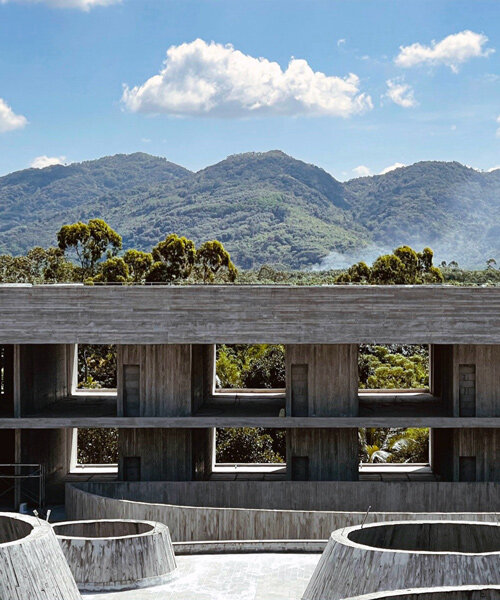 rainwater cascades in thin curtains within synchronicity's 'rain house' in hainan