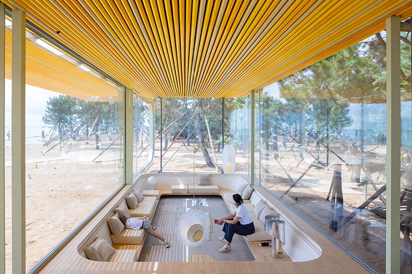 selgascano composes transparent seaside café from three parallel glass volumes in china