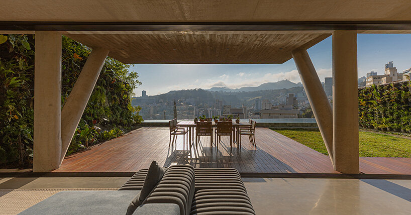 TETRO elevates house on concrete tree-like columns above the hills of belo horizonte, brazil