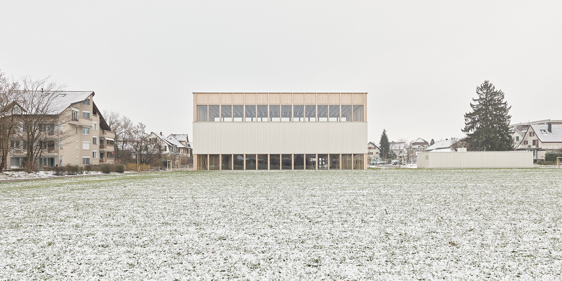 vertical-timber-construction-twin-stacked-sports-halls-switzerland-kit-designboom-1800-2