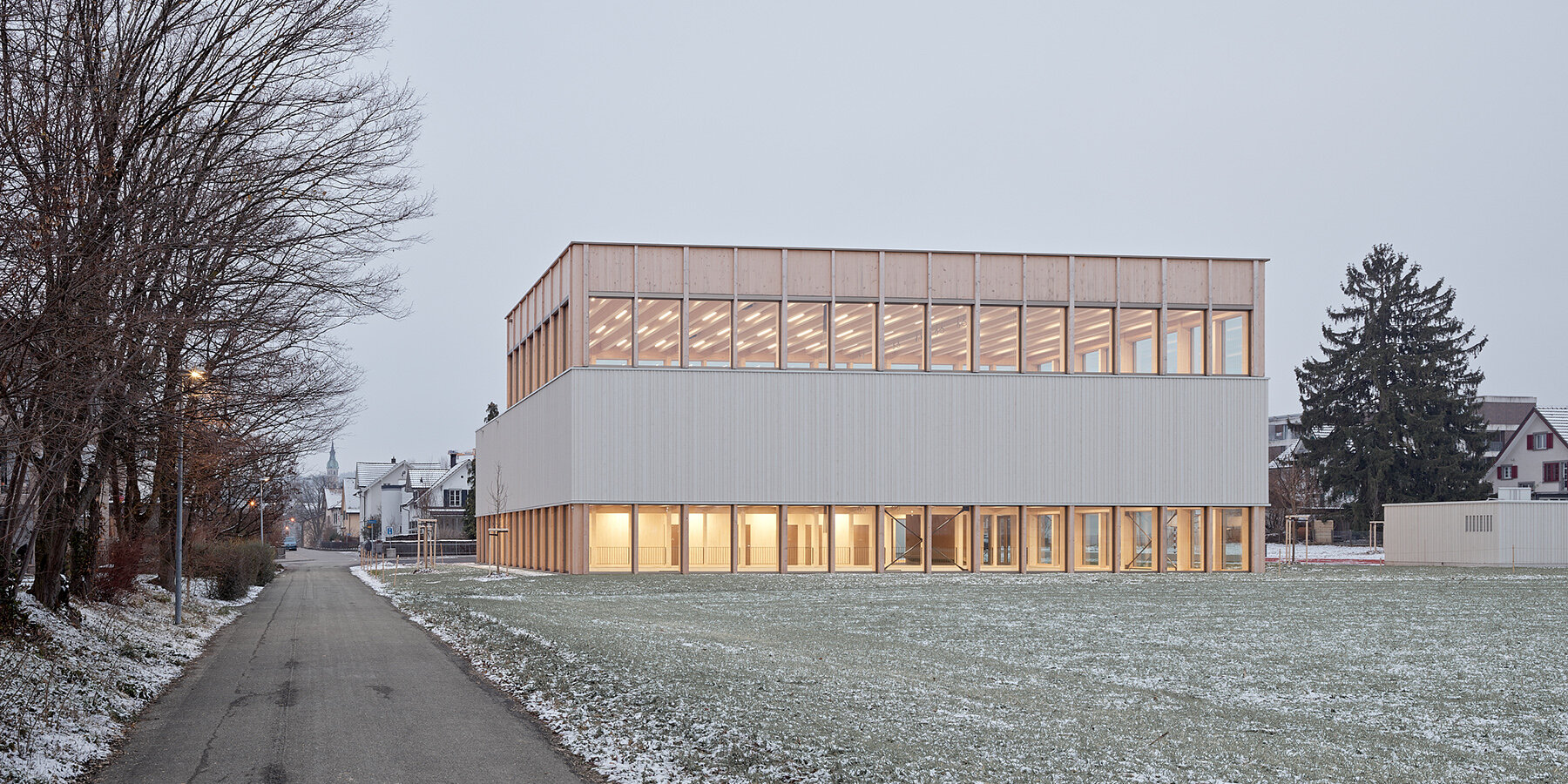 vertical-timber-construction-twin-stacked-sports-halls-switzerland-kit-designboom-1800-3