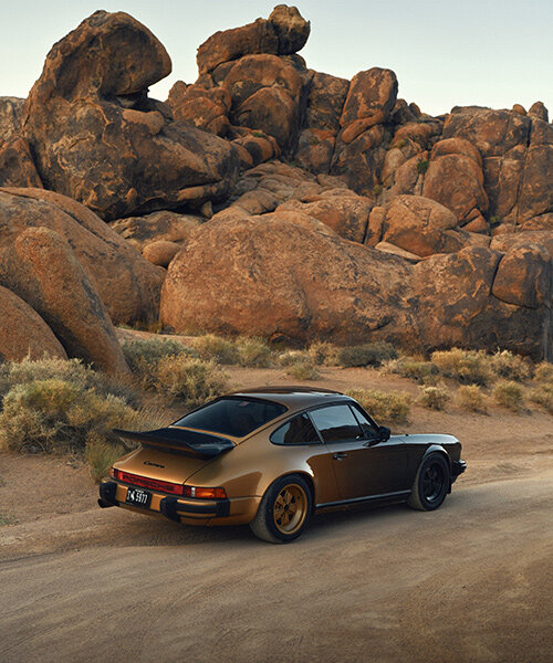 black to gold: refinished 1984 porsche 911 glimmers in the california desert