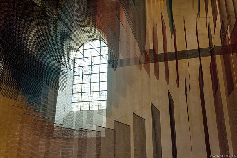 451 sheets of mesh compose floating chromatic field by tomislav topić inside french chapel