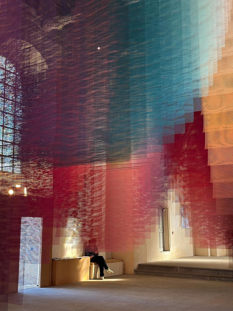 451 sheets of mesh compose floating chromatic field by tomislav topić inside french chapel