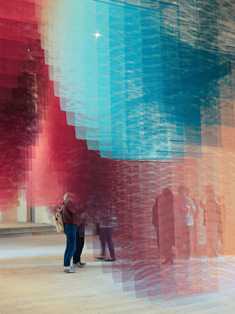 451 sheets of mesh compose floating chromatic field by tomislav topić inside french chapel