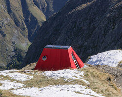 red bivouac shelter in the alps becomes high-altitude base for bergamo's modern art gallery