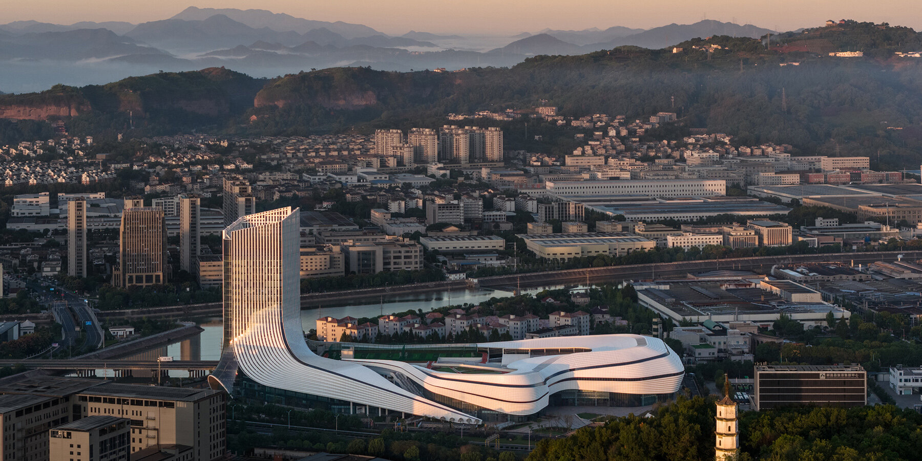 aluminum-panels-landscape-inspired-undulating-facade-sports-mall-line-plus-studio-designboom-1800-3