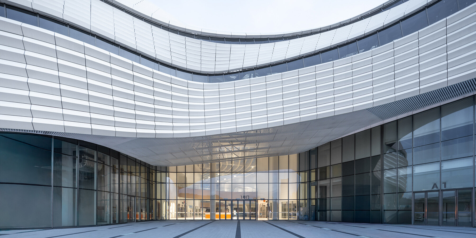aluminum-panels-landscape-inspired-undulating-facade-sports-mall-line-plus-studio-designboom-1800-5