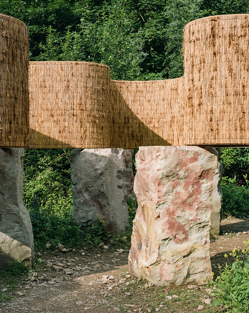 atelier faber stacks reeds over luxembourg sandstone to revive soil porosity on old well site