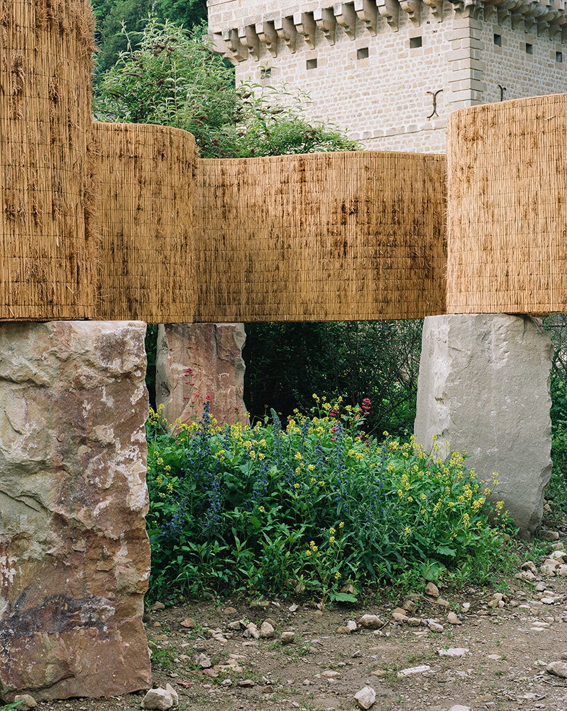 atelier faber stacks reeds over luxembourg sandstone to revive soil porosity on old well site