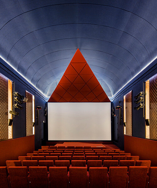 BACH converts reina sofía's auditorium into red-velvet cinema beneath blue vault in madrid