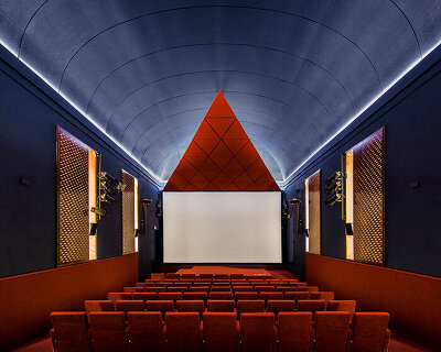 BACH converts reina sofía's auditorium into red-velvet cinema beneath blue vault in madrid