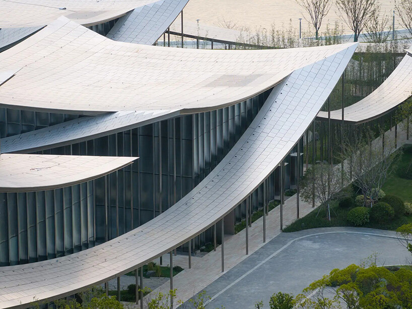 BIG's suzhou museum of contemporary art nears completion beneath ribbon-like roof
