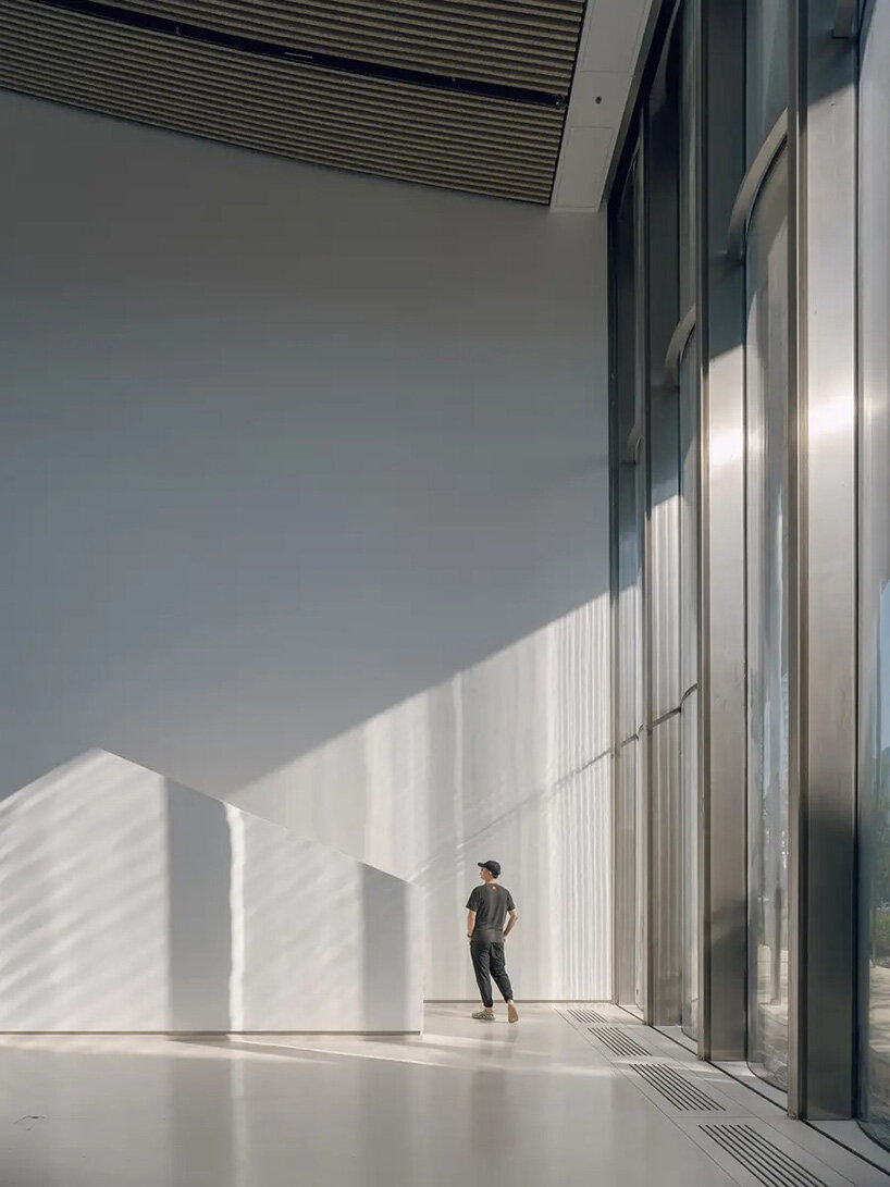 BIG's suzhou museum of contemporary art nears completion beneath ribbon-like roof