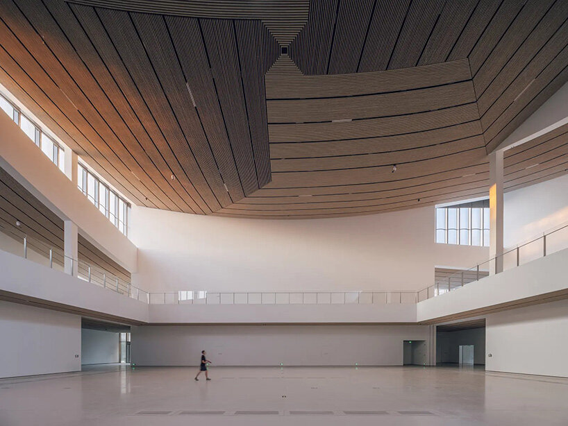 BIG's suzhou museum of contemporary art nears completion beneath ribbon-like roof