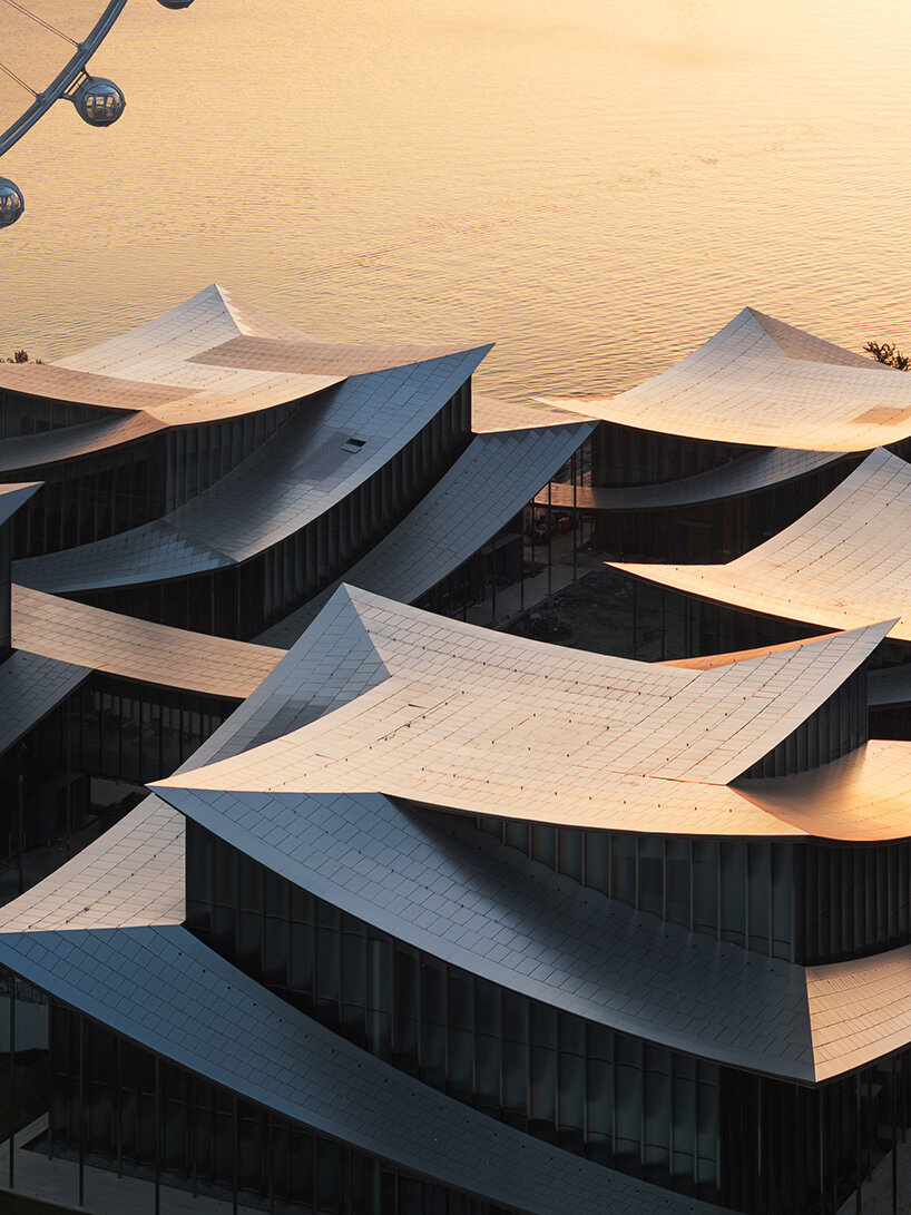 BIG's suzhou museum of contemporary art nears completion beneath ribbon-like roof