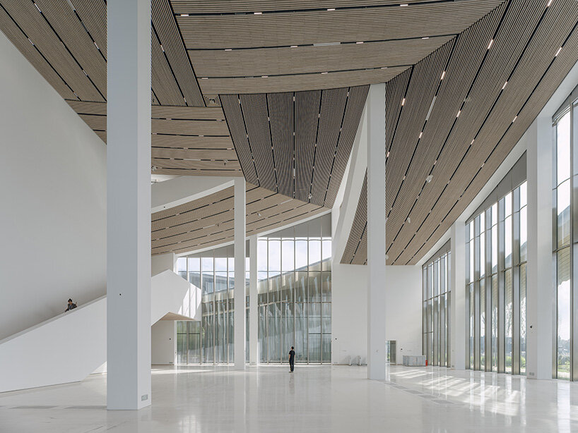 BIG's suzhou museum of contemporary art nears completion beneath ribbon-like roof