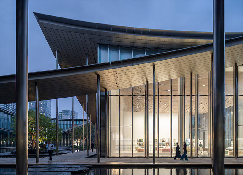 BIG's suzhou museum of contemporary art nears completion beneath ribbon-like roof