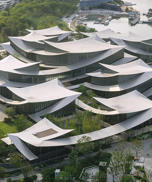 BIG's suzhou museum of contemporary art nears completion beneath ribbon-like roof