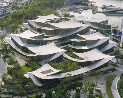 BIG's suzhou museum of contemporary art nears completion beneath ribbon-like roof