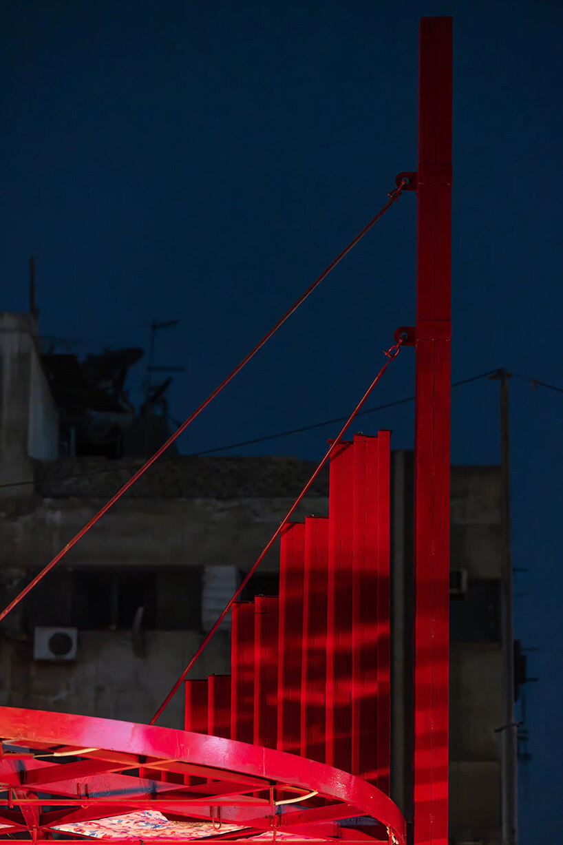 bright-red outdoor theater restores community use to cairo park amid loss of green spaces