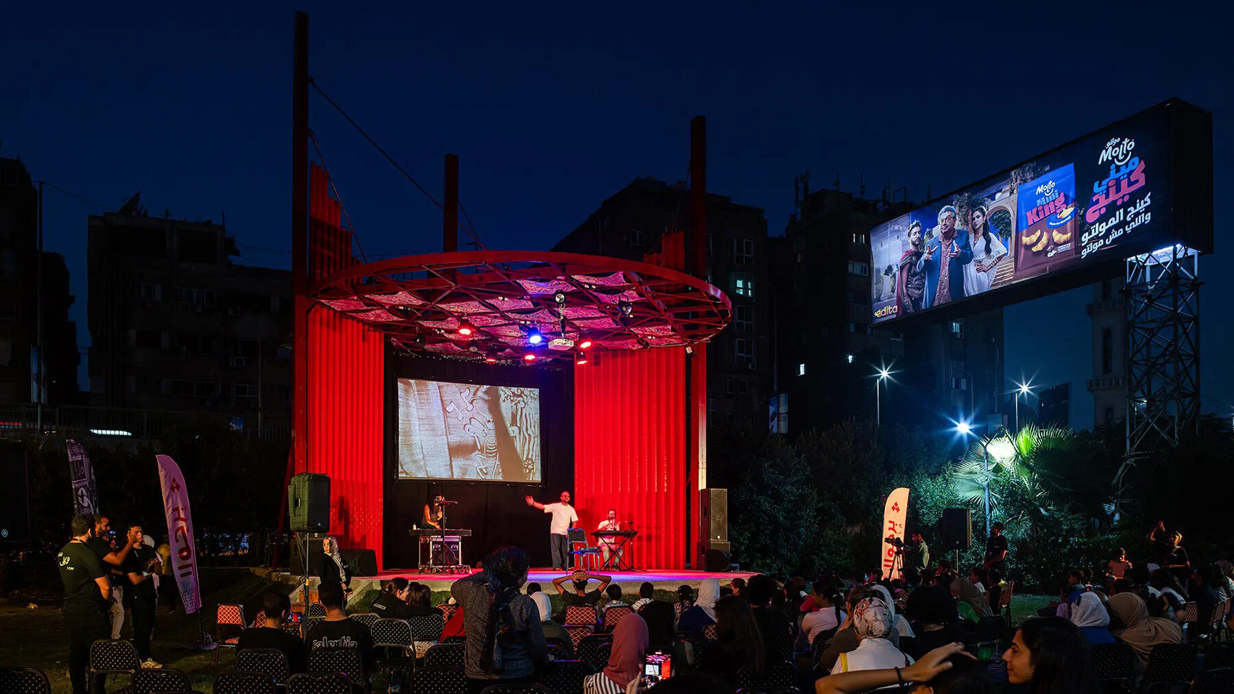 bright-red-outdoor-theater-community-use-cairo-park-loss-green-spaces-thiss-studio-cluster-pergola-designboom-large02
