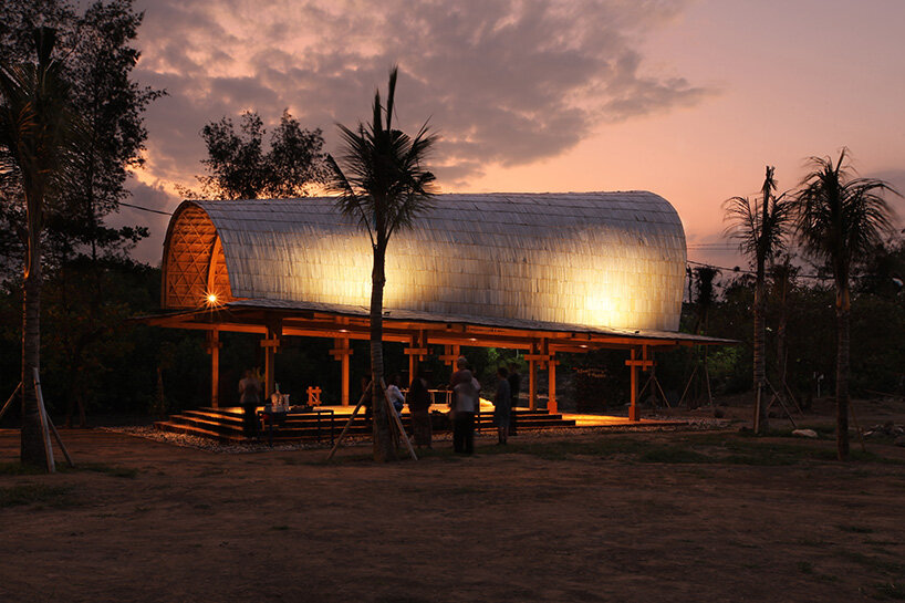 carbon-negative bamboo pavilion by cave urban gives new life to disused car park in bali