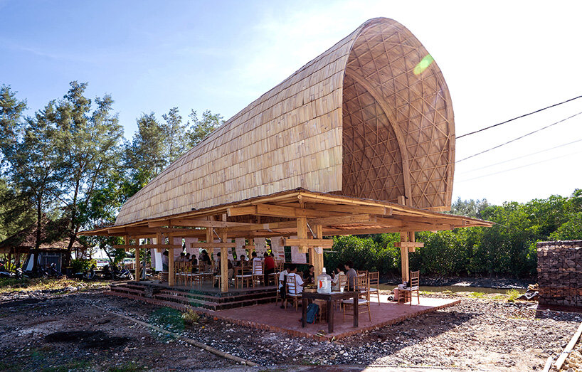 carbon-negative bamboo pavilion by cave urban gives new life to disused car park in bali