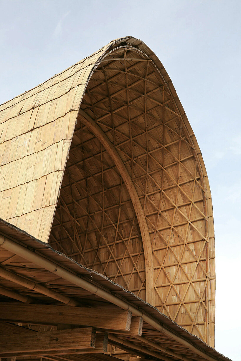carbon-negative bamboo pavilion by cave urban gives new life to disused car park in bali