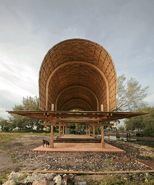 carbon-negative bamboo pavilion by cave urban gives new life to disused car park in bali