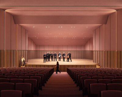 bright pink interior revitalizes adaptive acoustic music hall for sax’s cultural complex in spain