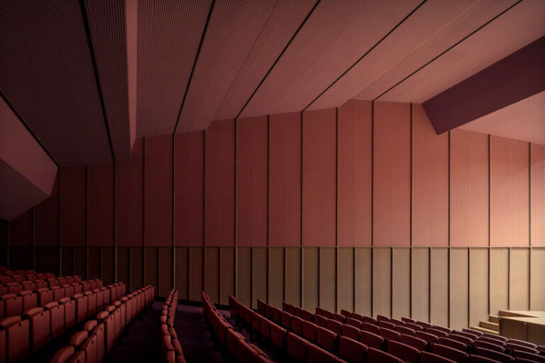 bright pink interior revitalizes sax adaptive acoustic music hall in spain