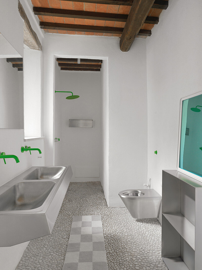 crosby studios restores 17th-century tuscan farmhouse with metallic and sculptural details