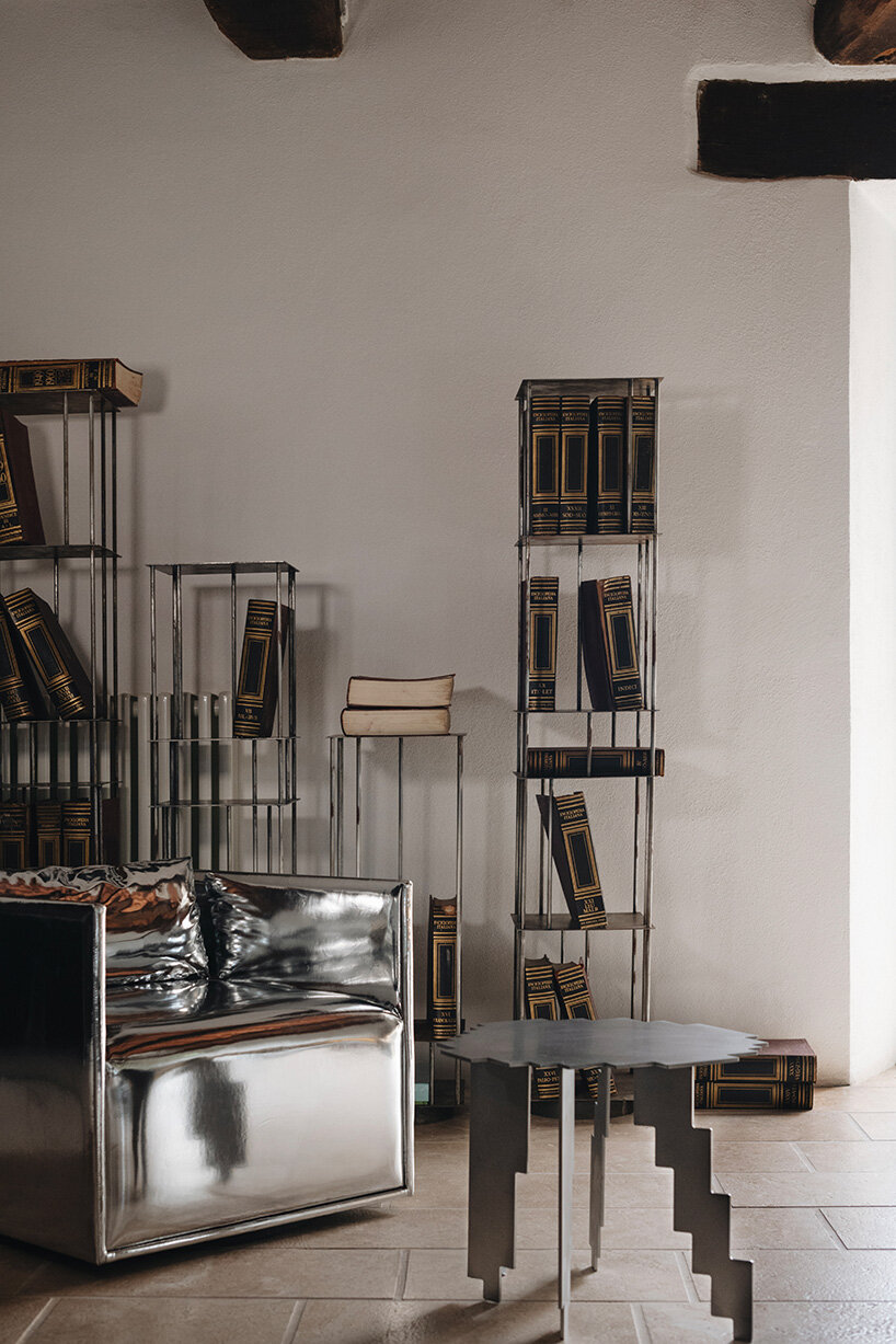 crosby studios restores 17th-century tuscan farmhouse with metallic and sculptural details