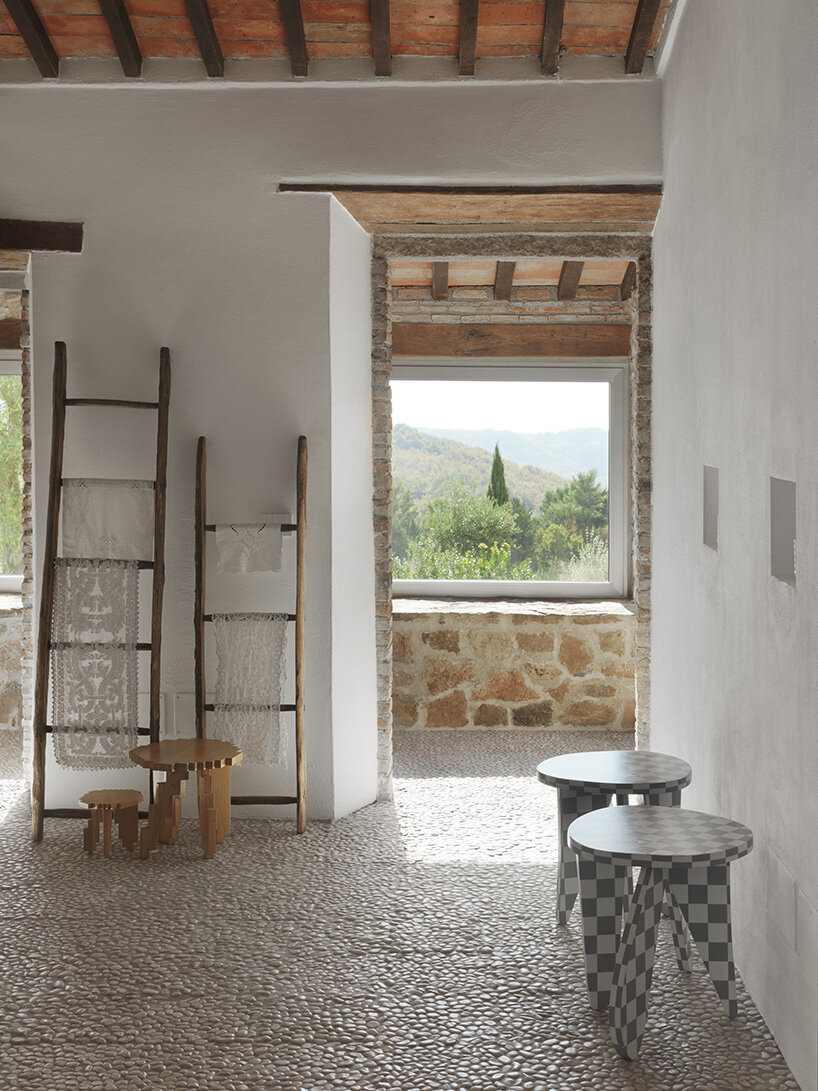 crosby studios restores 17th-century tuscan farmhouse with metallic and sculptural details
