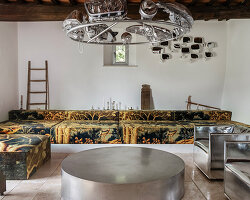 crosby studios restores 17th-century tuscan farmhouse with metallic and sculptural details